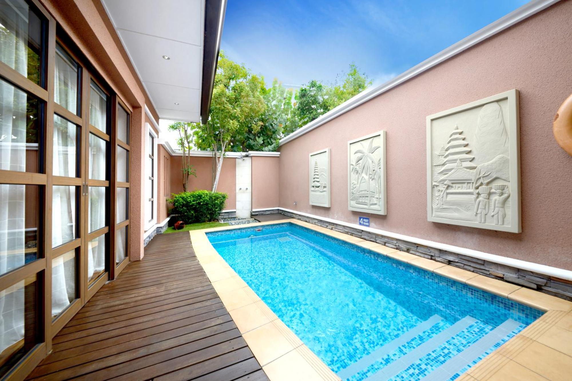 Grand Lexis Port Dickson Hotel Exterior photo A private pool at a hotel