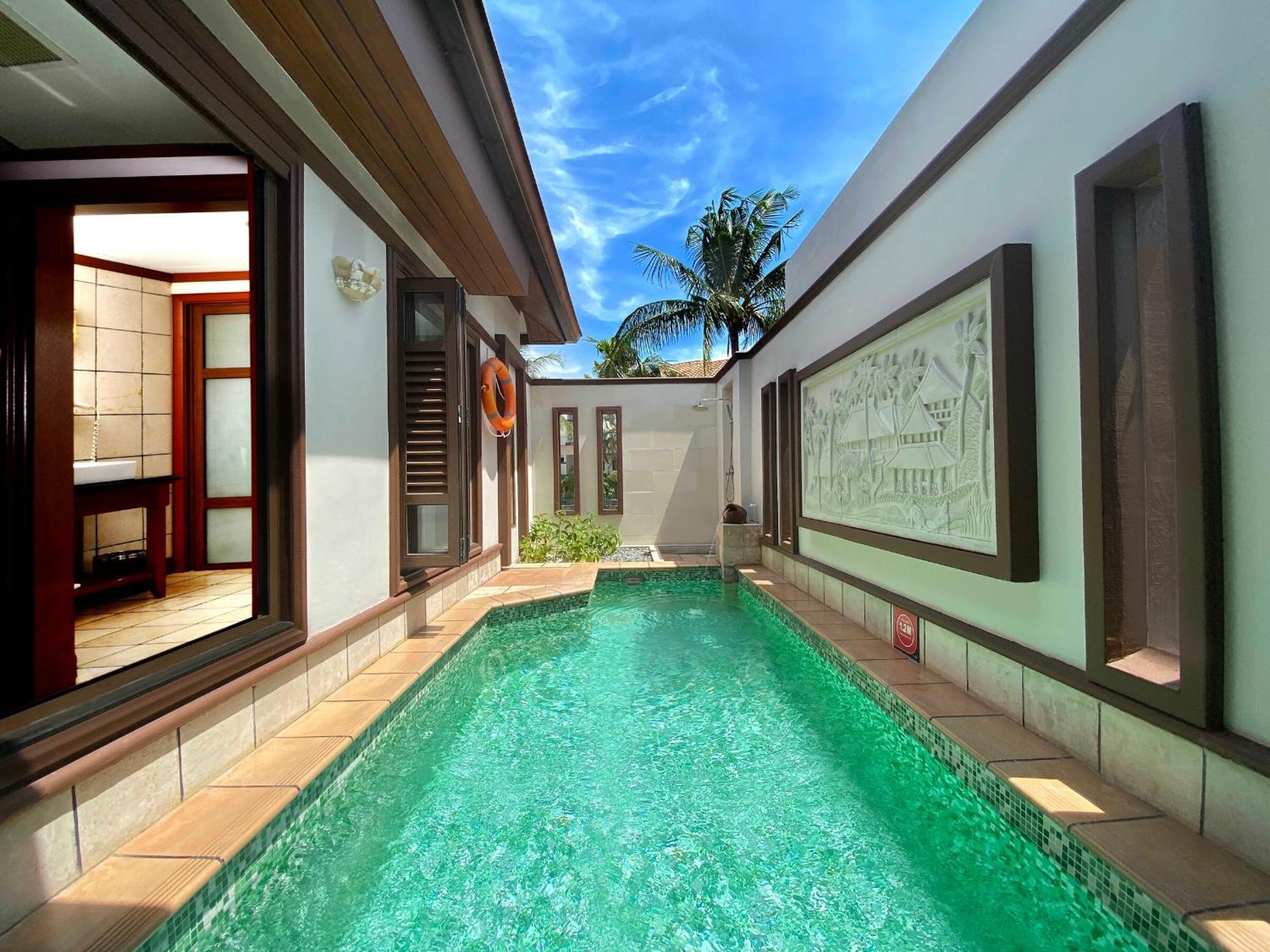 Grand Lexis Port Dickson Hotel Exterior photo A pool villa at the resort
